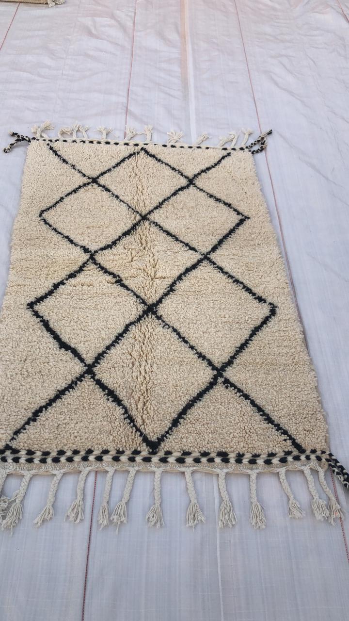 Black Symmetrical Art on Cream