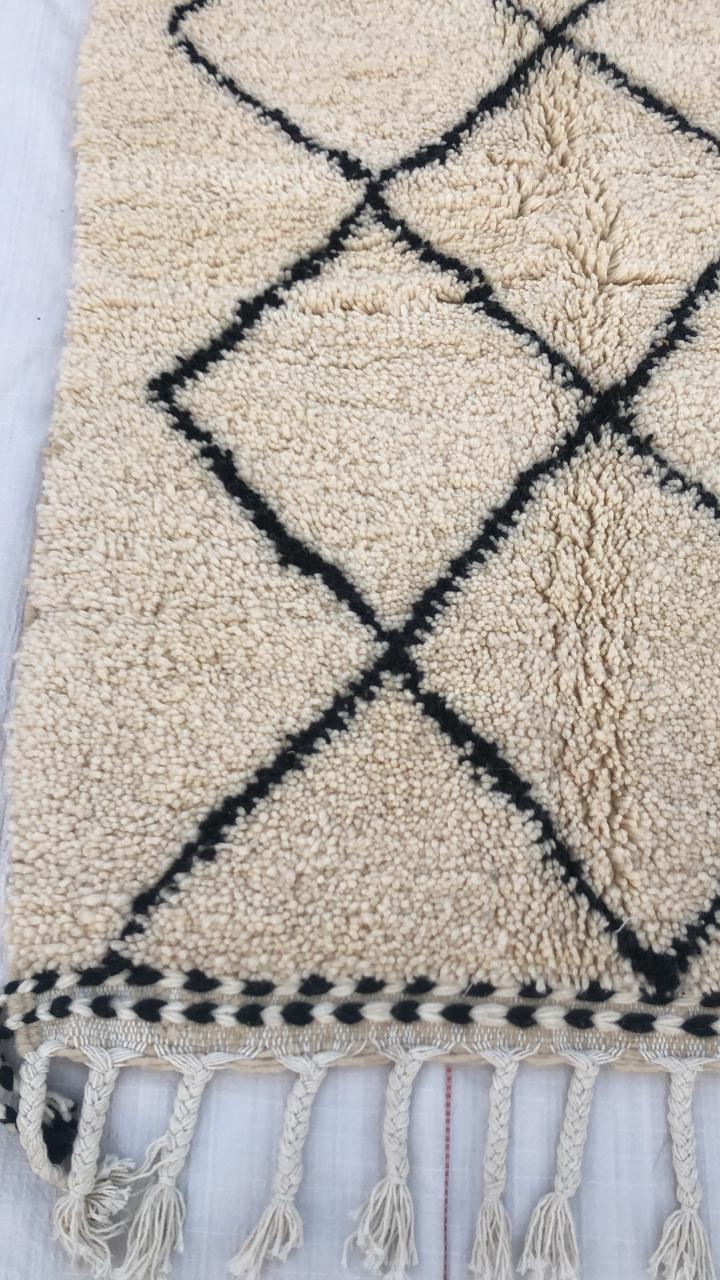 Black Symmetrical Art on Cream